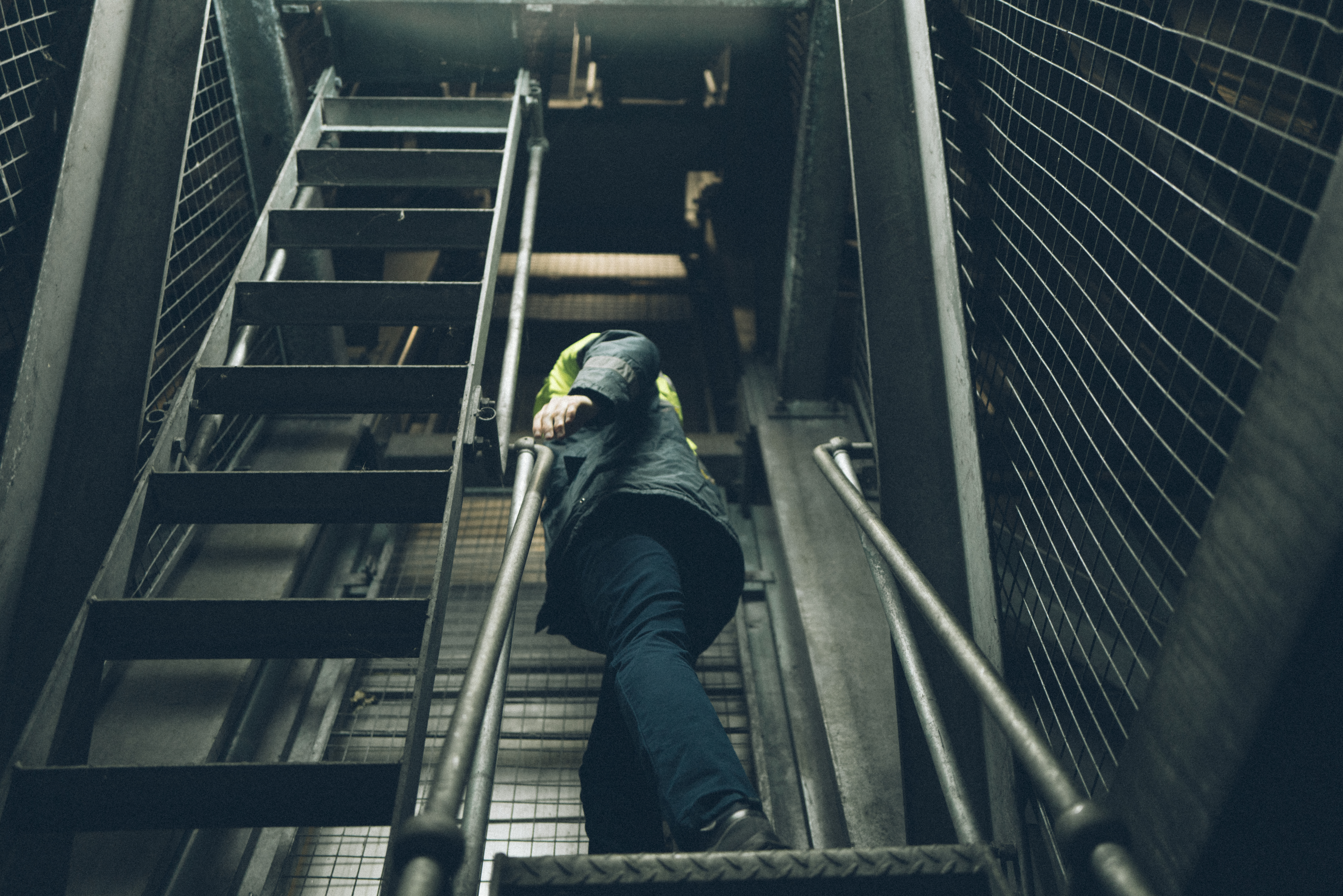 A person in a water tower plant room.