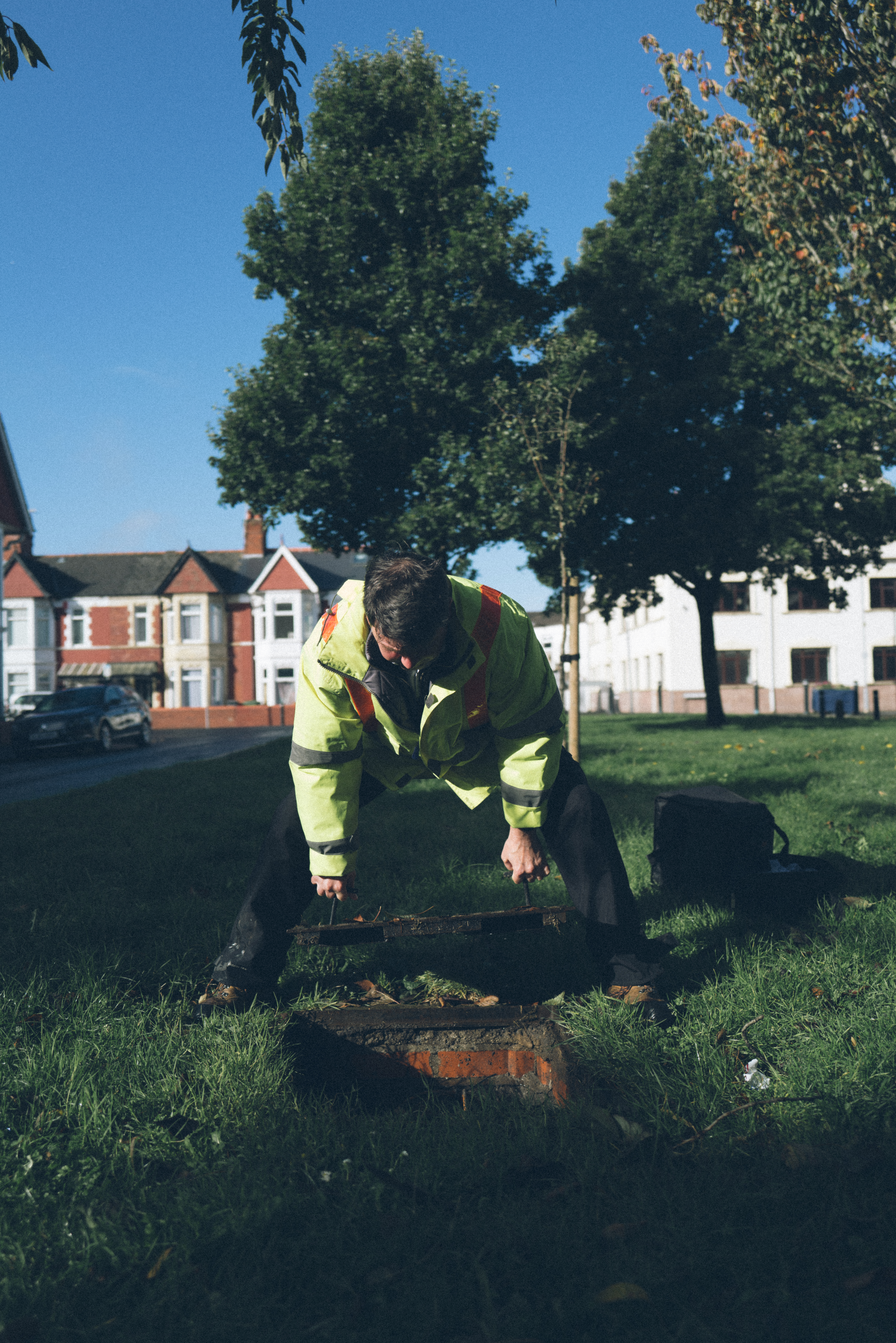 A person monitoring a borehole.
