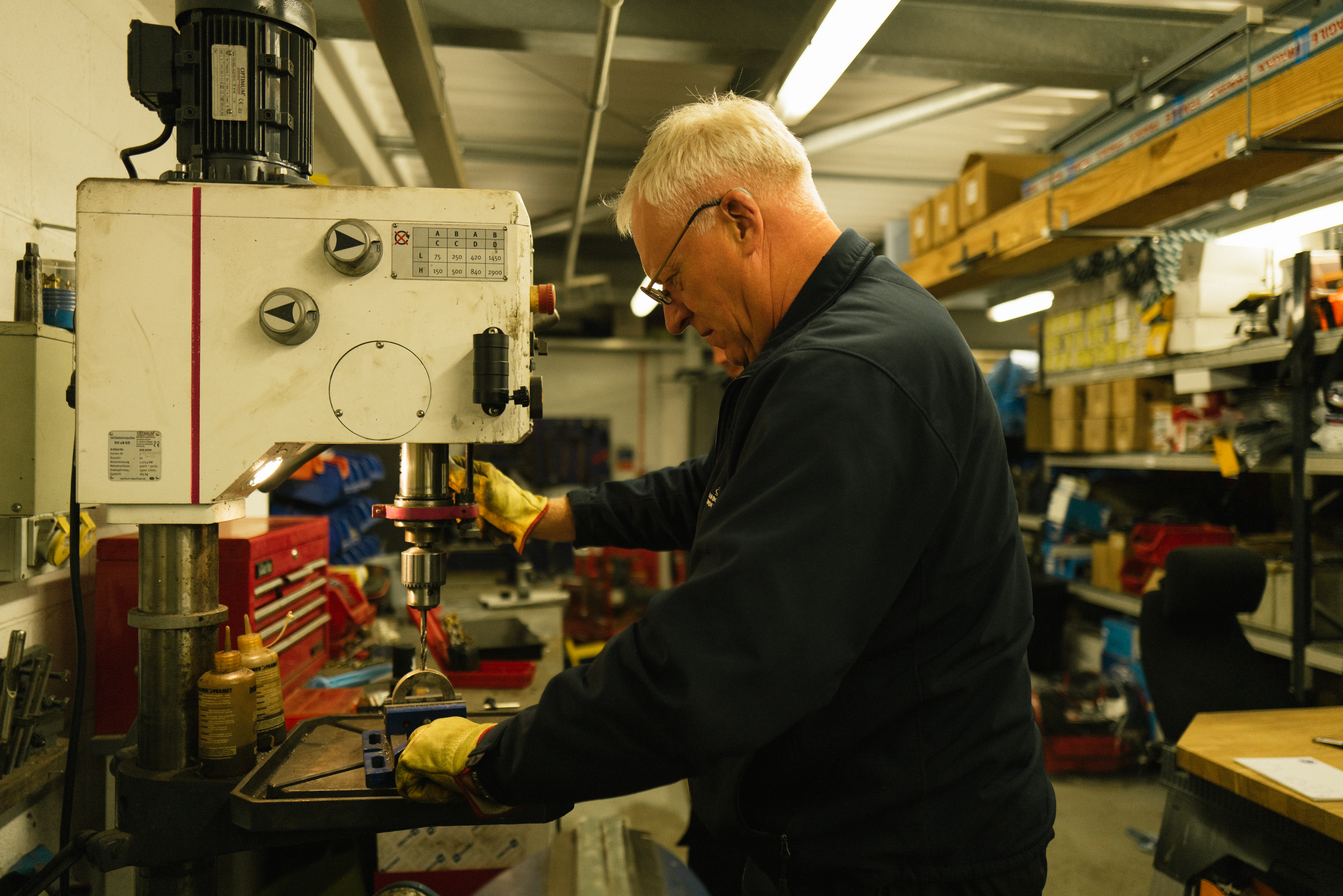 A person  using engineering equipment.