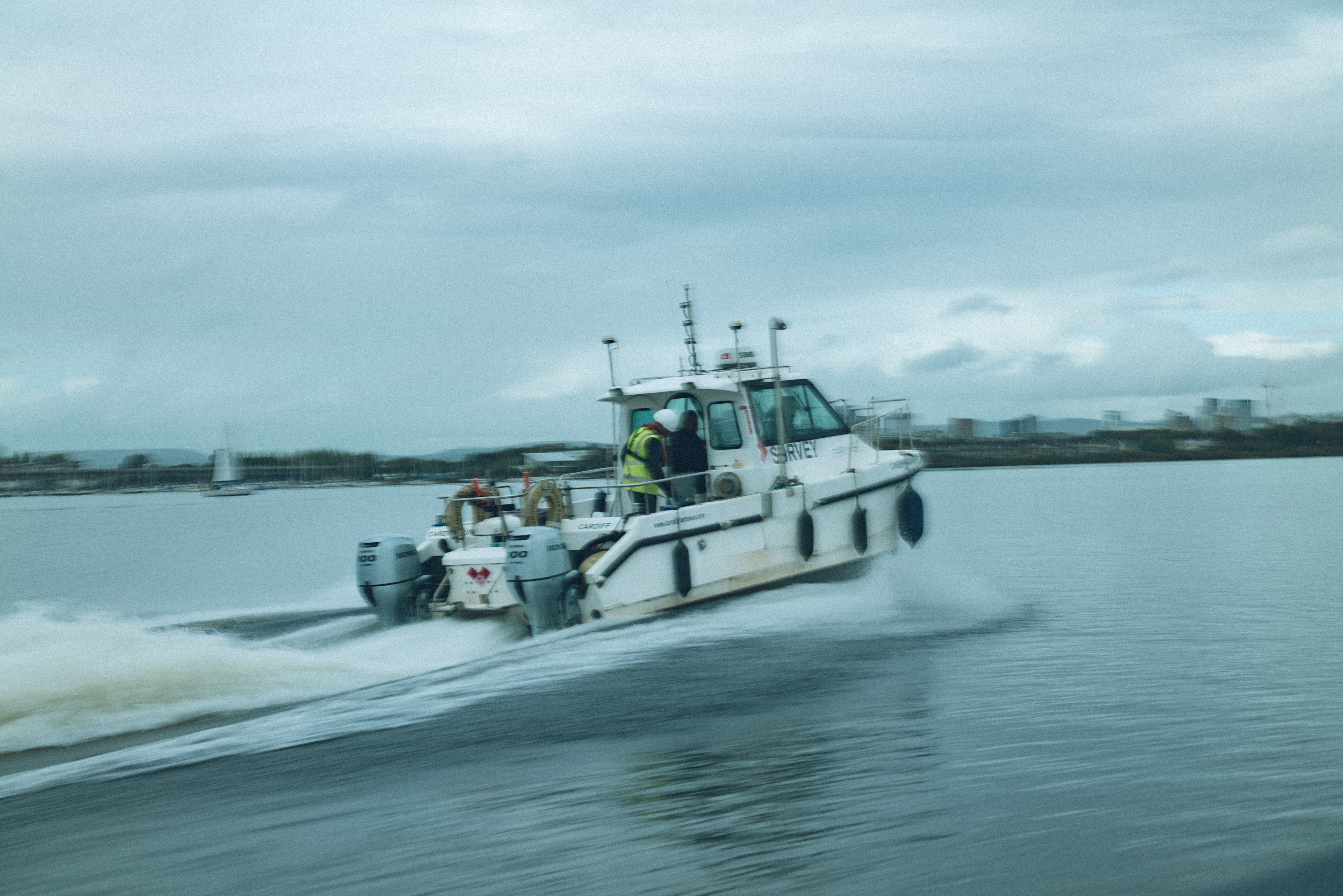 A boat travelling in water,